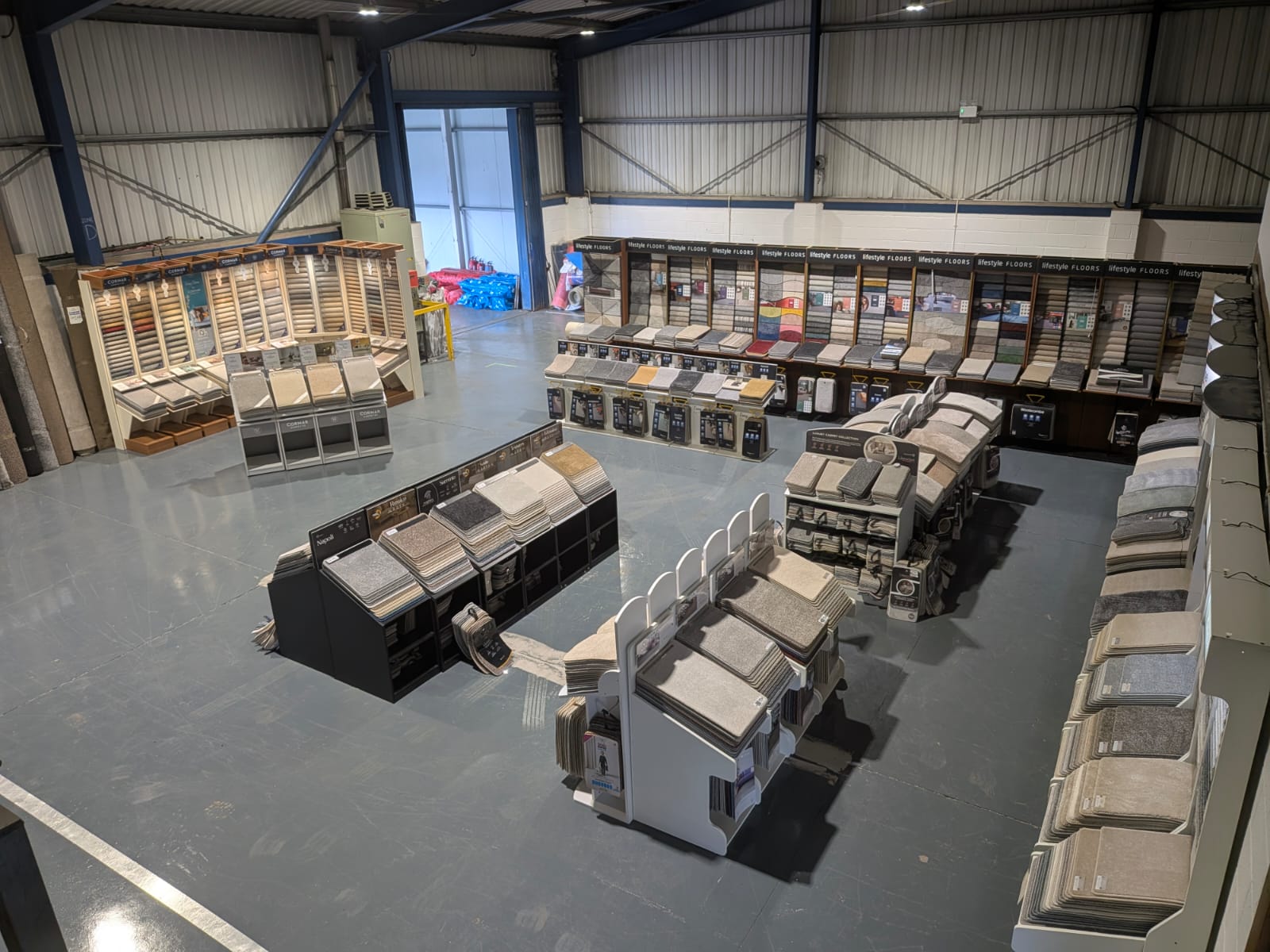 Inside the new Craig McLean Flooring showroom in Penrith, full of carpet displays